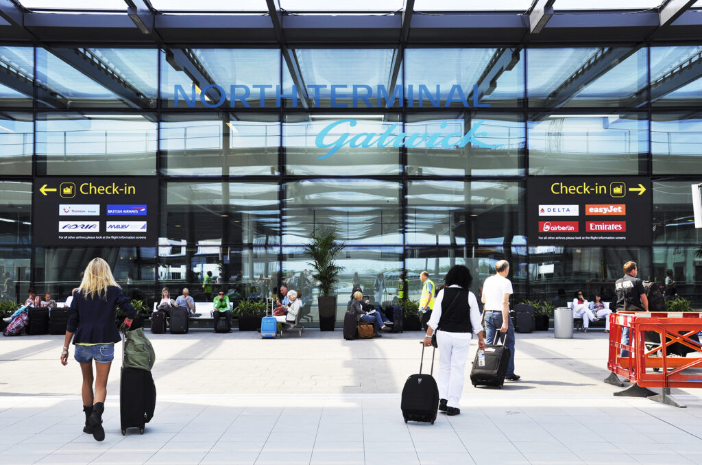 Passengers travelling through Gatwick Airport
